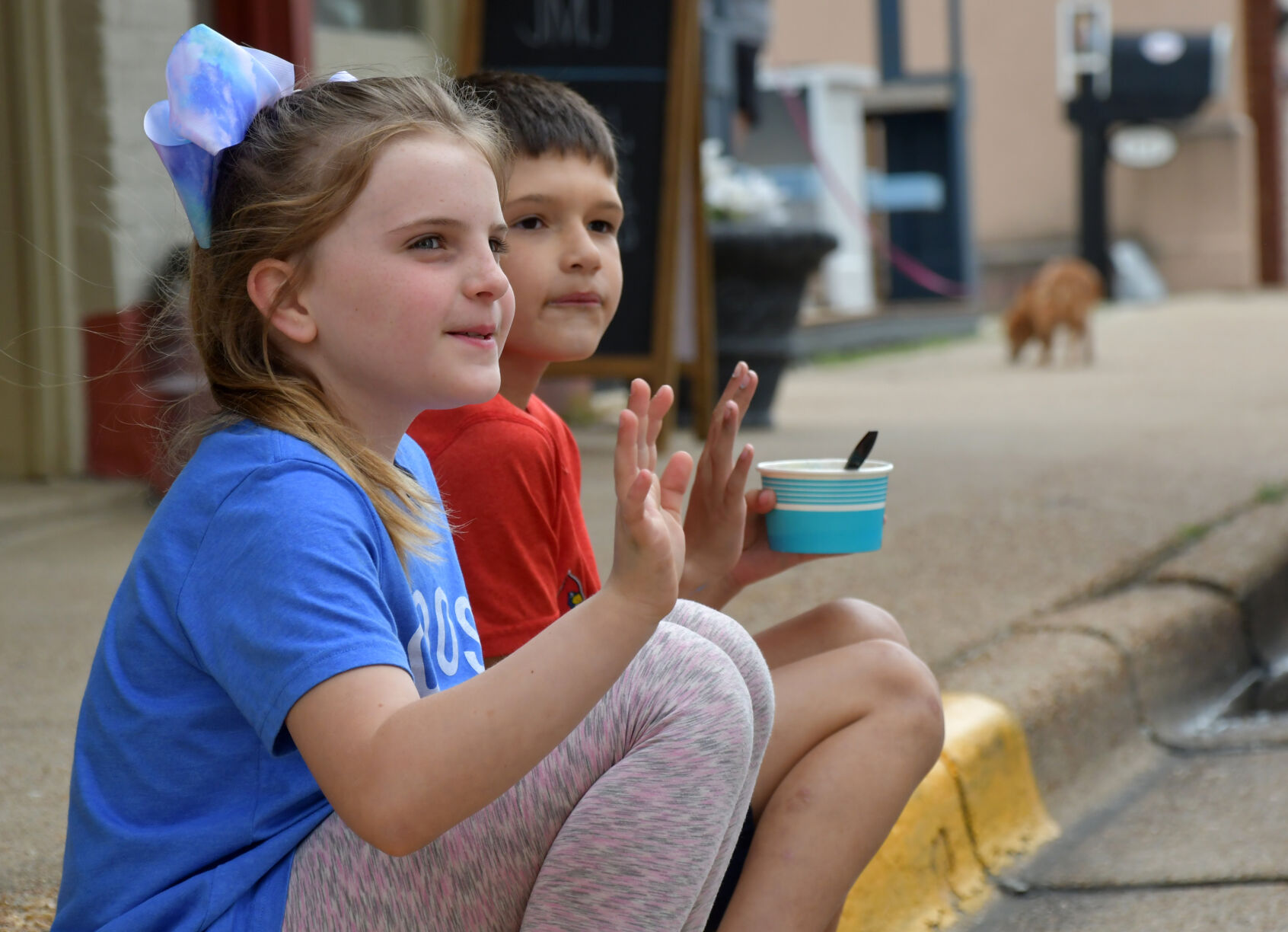Brook Snider and Isaac Booth wave